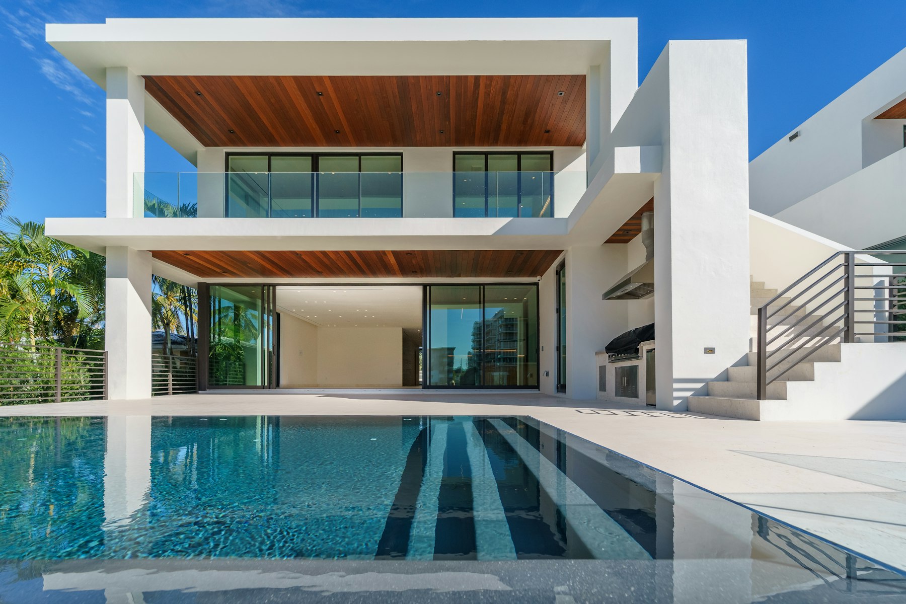 Two-story modern home with infinity pool